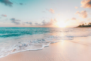 a beautiful sunset on a beach in Seychelles